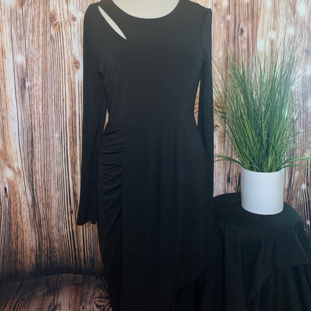 Ankle length black dress.